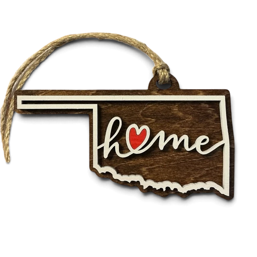 Trail and Timber Co. laser-cut wooden Oklahoma state ornament with home script and red heart accent