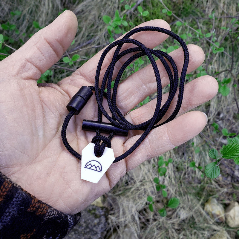 Load image into Gallery viewer, Emergency Fire Starter Necklace - Ultra Lightweight Mini Ferro Rod with Ceramic Striker &amp; Neck Lanyard
