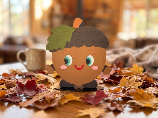 Painted wooden acorn with a textured cap, assembled from the Trail and Timber Co Fall Acorn DIY Kit