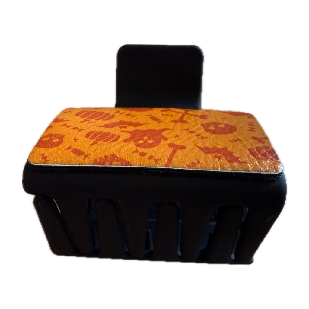 Side view of the mini Halloween leatherette claw hair clip