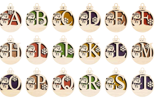Trail and Timber Co custom wooden monogram Christmas ornaments featuring 3D snowman and snowflake laser-cut designs.