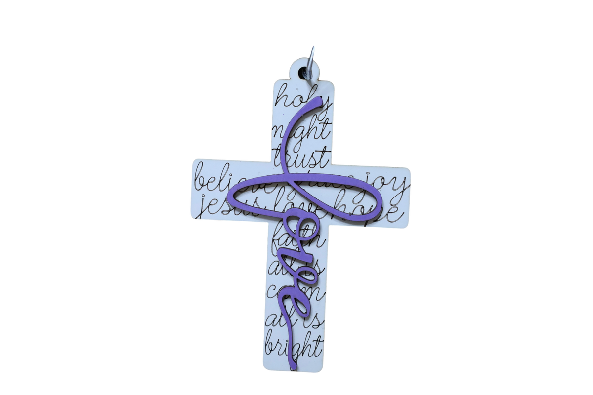 Trail and Timber Co Faith cross ornament featuring a white wooden base with script text and a purple love overlay