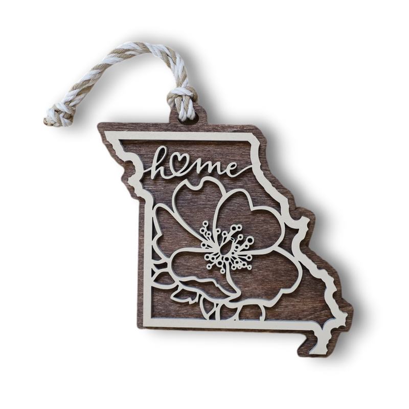 Load image into Gallery viewer, Trail and Timber Co. laser-cut wooden Missouri state ornament with floral Home design and hanging twine.
