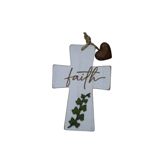 Trail and Timber Co white wooden cross ornament featuring the word faith, green ivy leaves, and a small brown heart.