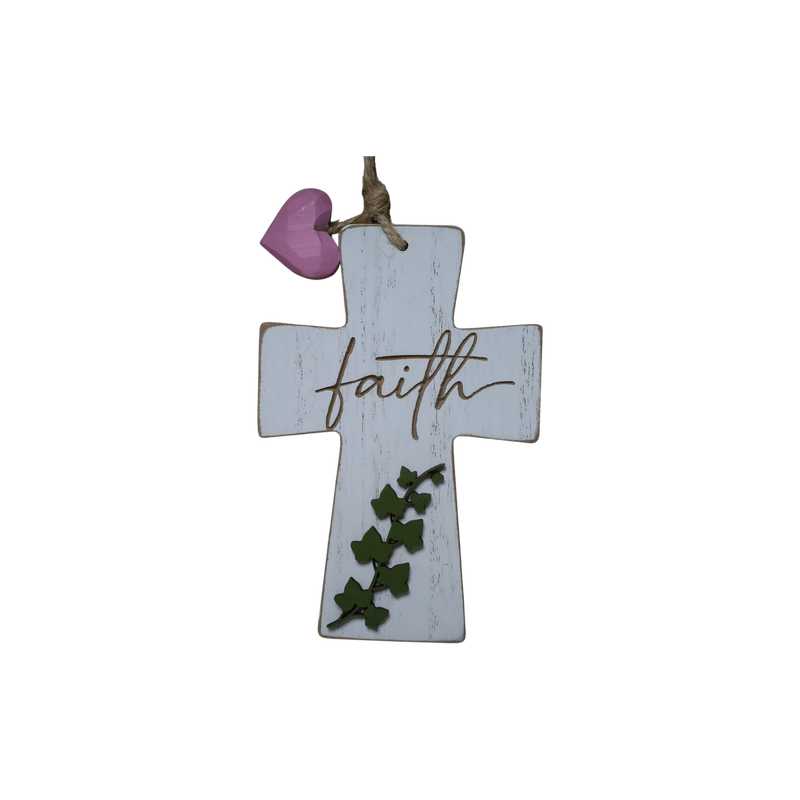 Load image into Gallery viewer, Trail and Timber Co white wooden cross ornament with faith script, green ivy leaves, and a small pink heart accent.
