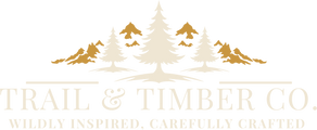 Trail and Timber Co. logo, cream and gold on transparent